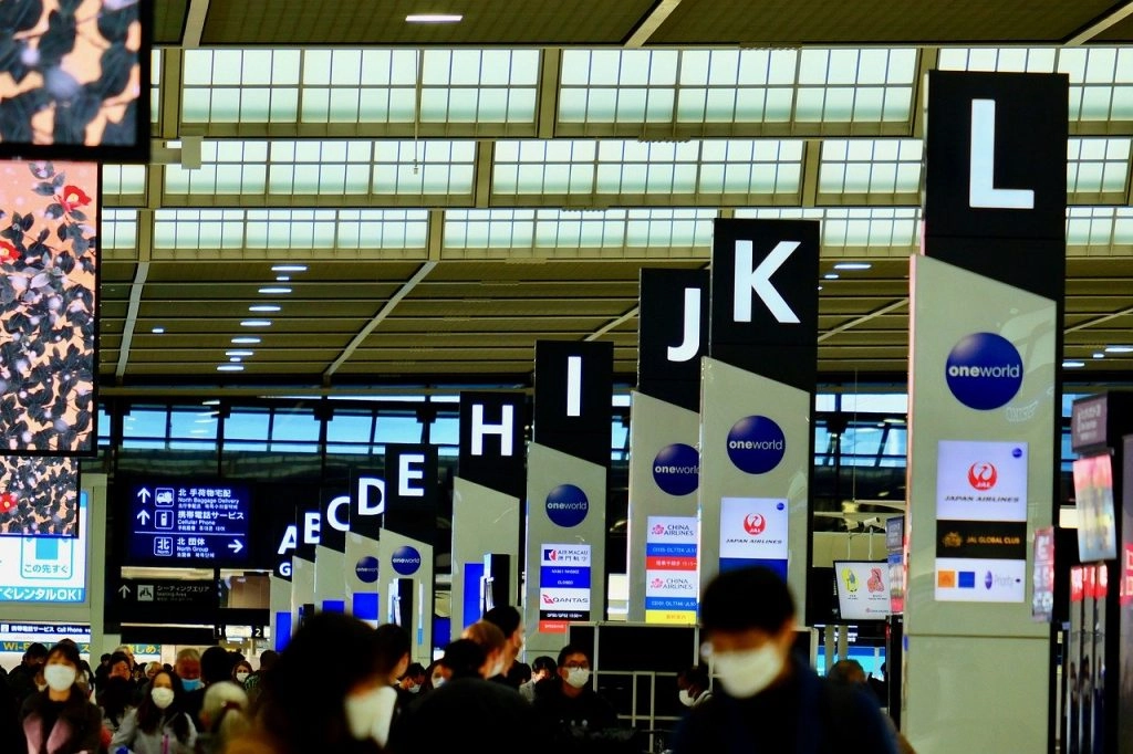 Airport Travelers Wearing Masks