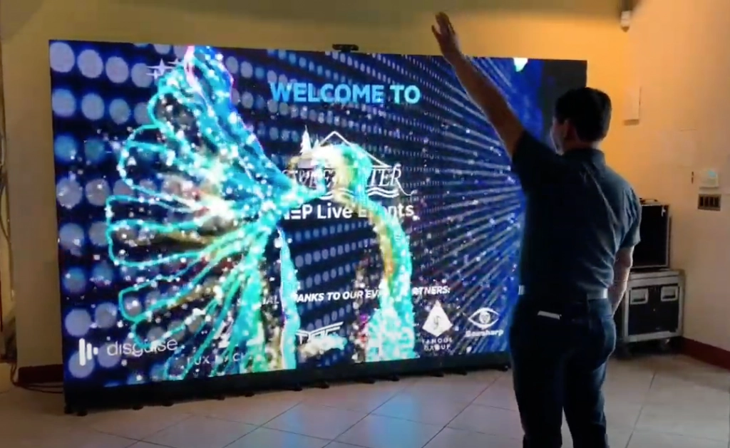 Man Interacts With a Zuzor Display