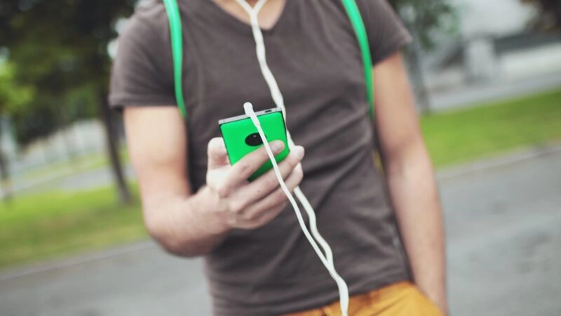 Headphones plugged into an external device
